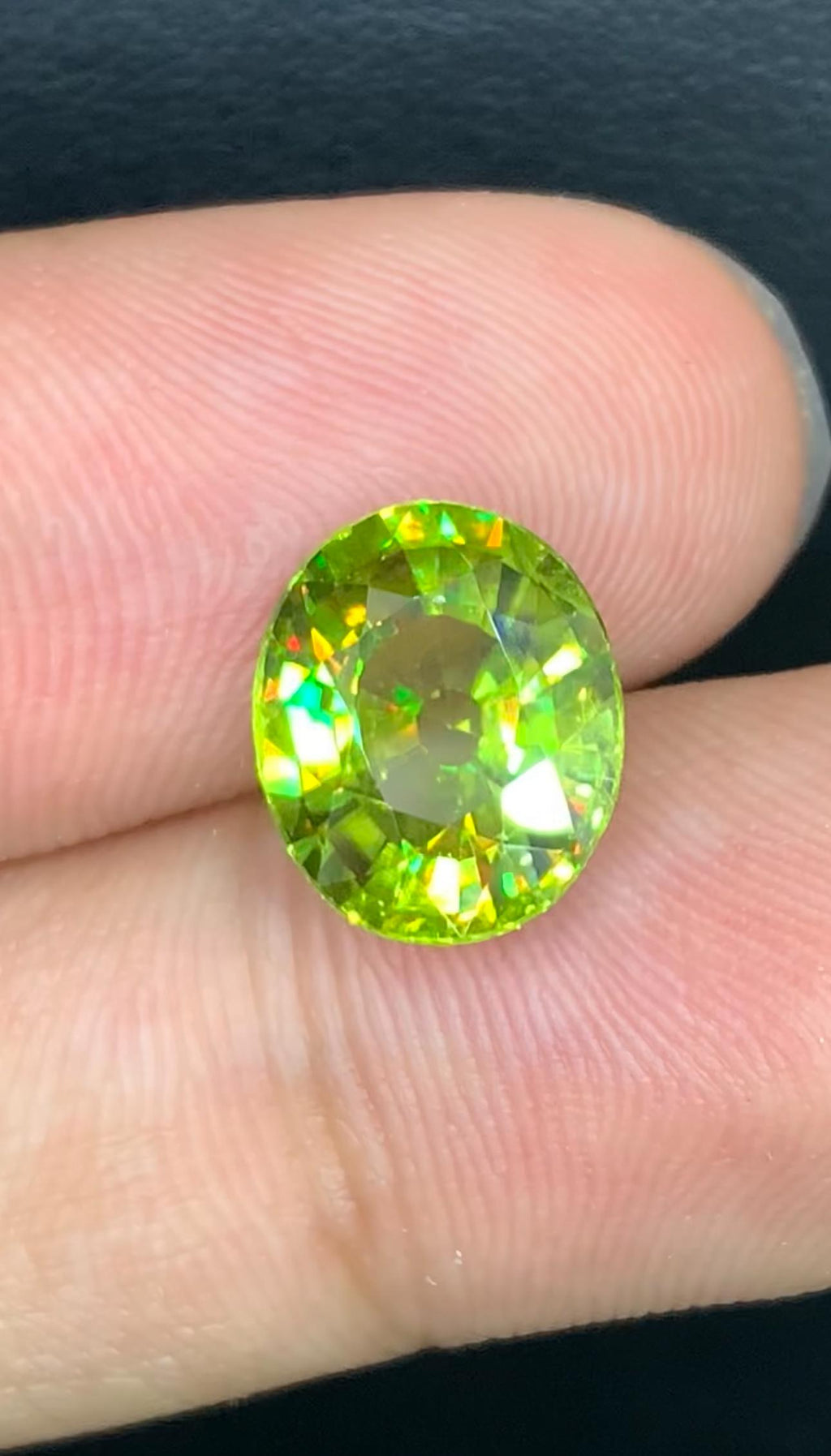 4.30 CT Oval Sphene Gemstone: Yellow-Green Titanite, Strong Trichroism