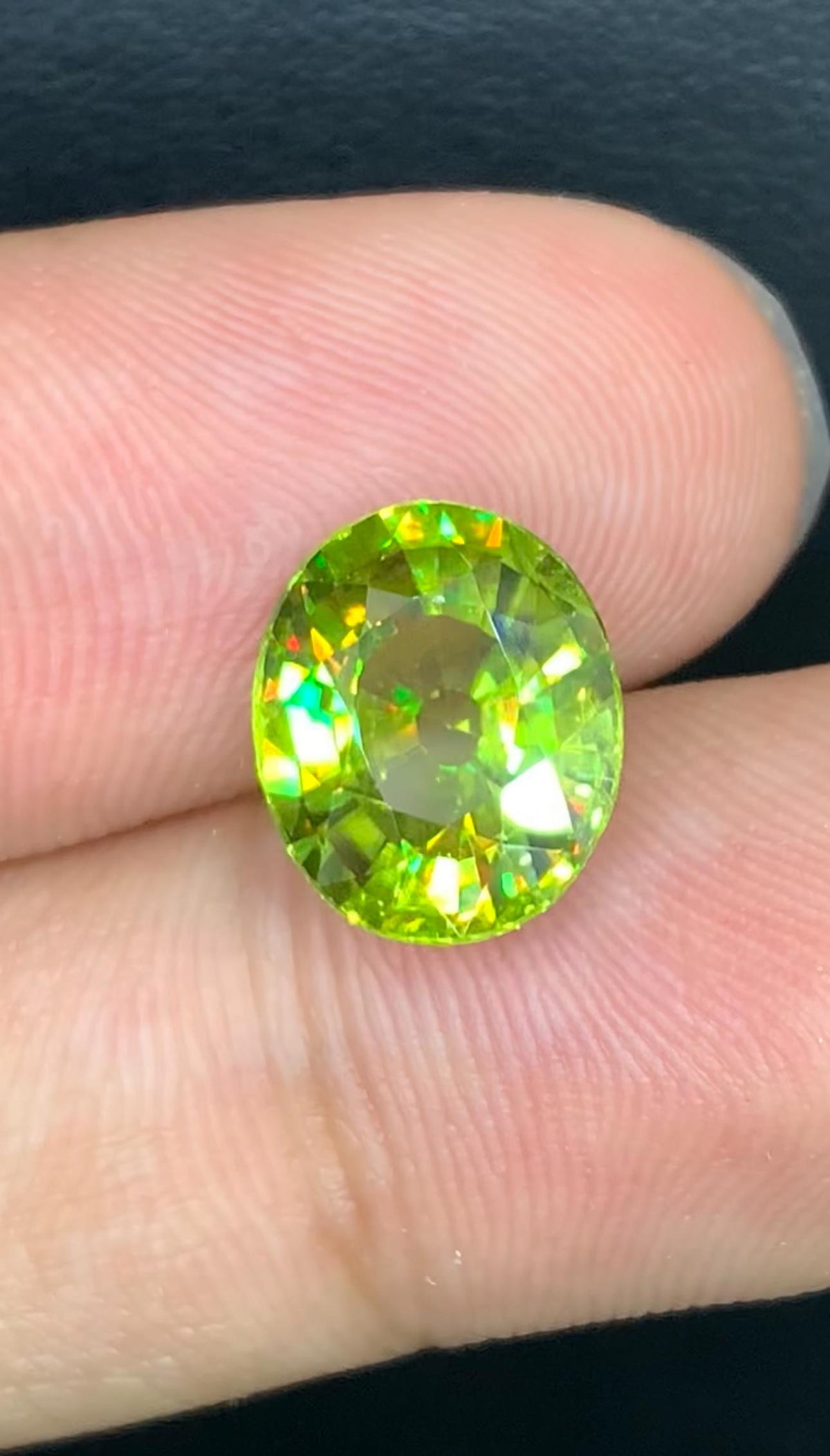 4.30 CT Oval Sphene Gemstone: Yellow-Green Titanite, Strong Trichroism