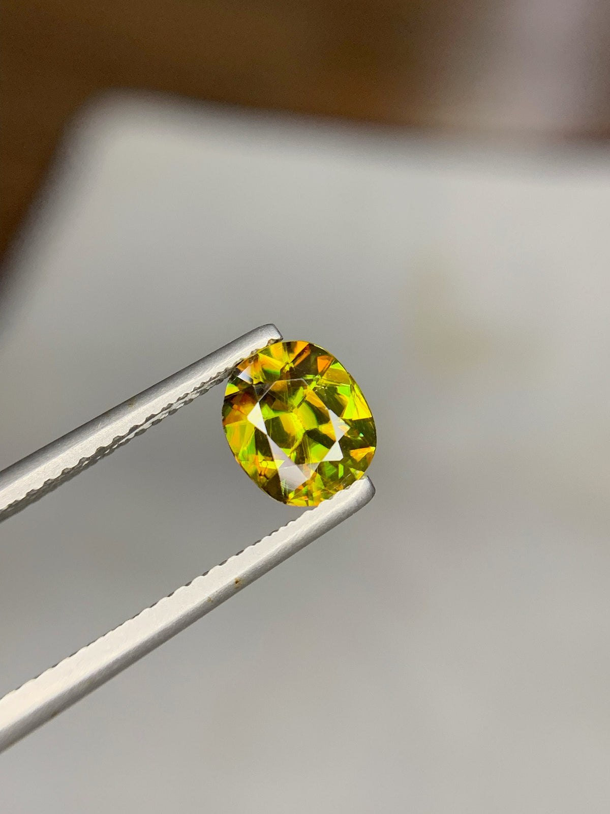 1.50 CT Natural Sphene Gemstone: Oval Cut, Himalayan Origin