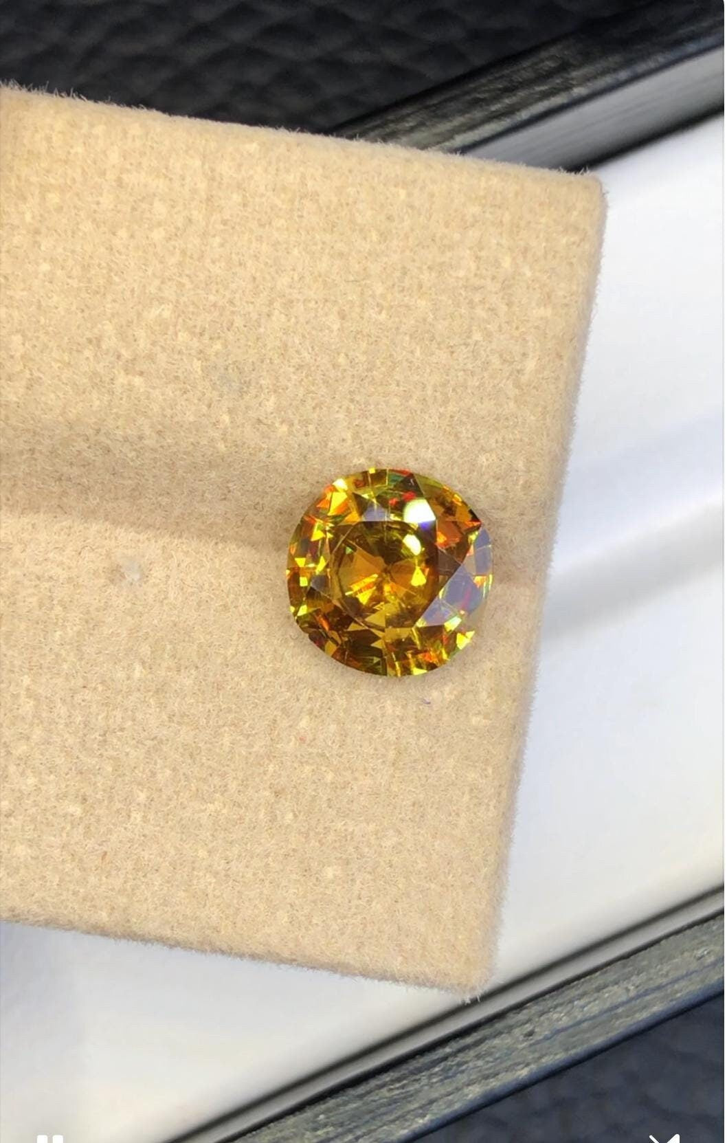 Trichroic Sphene Gemstone: 1.90 CT Round Cut, Zagi Mine