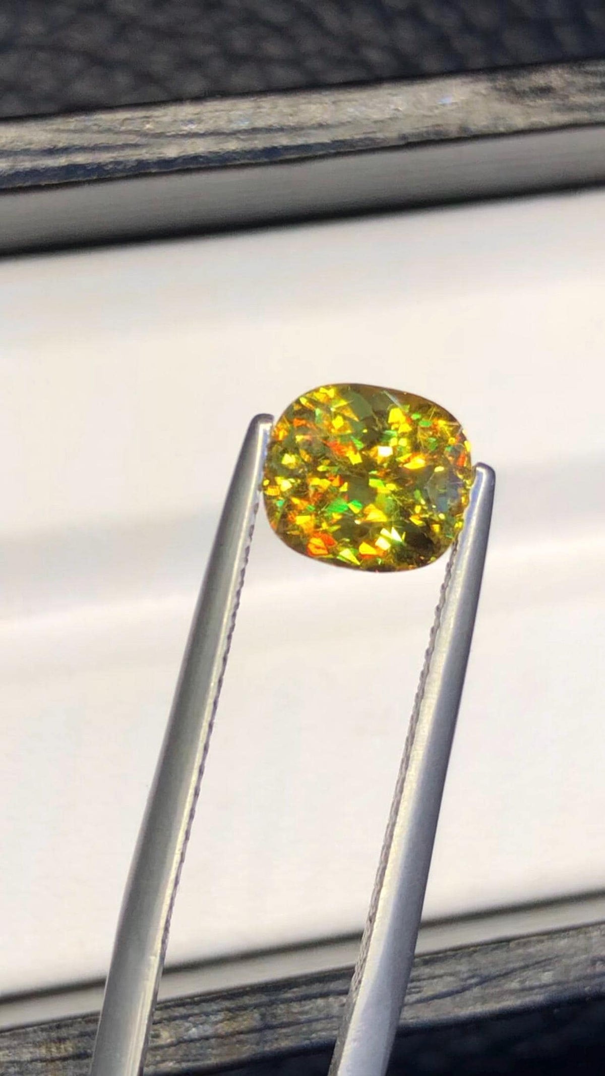 2.05 CT Cushion Cut Sphene Gemstone: Yellow-Red Trichroism