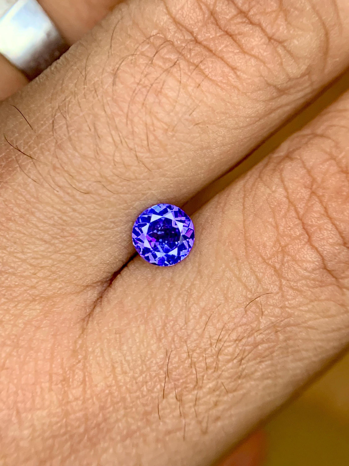 Certified 0.89 Carat Round Tanzanite: Violet-Blue Loose Gemstone