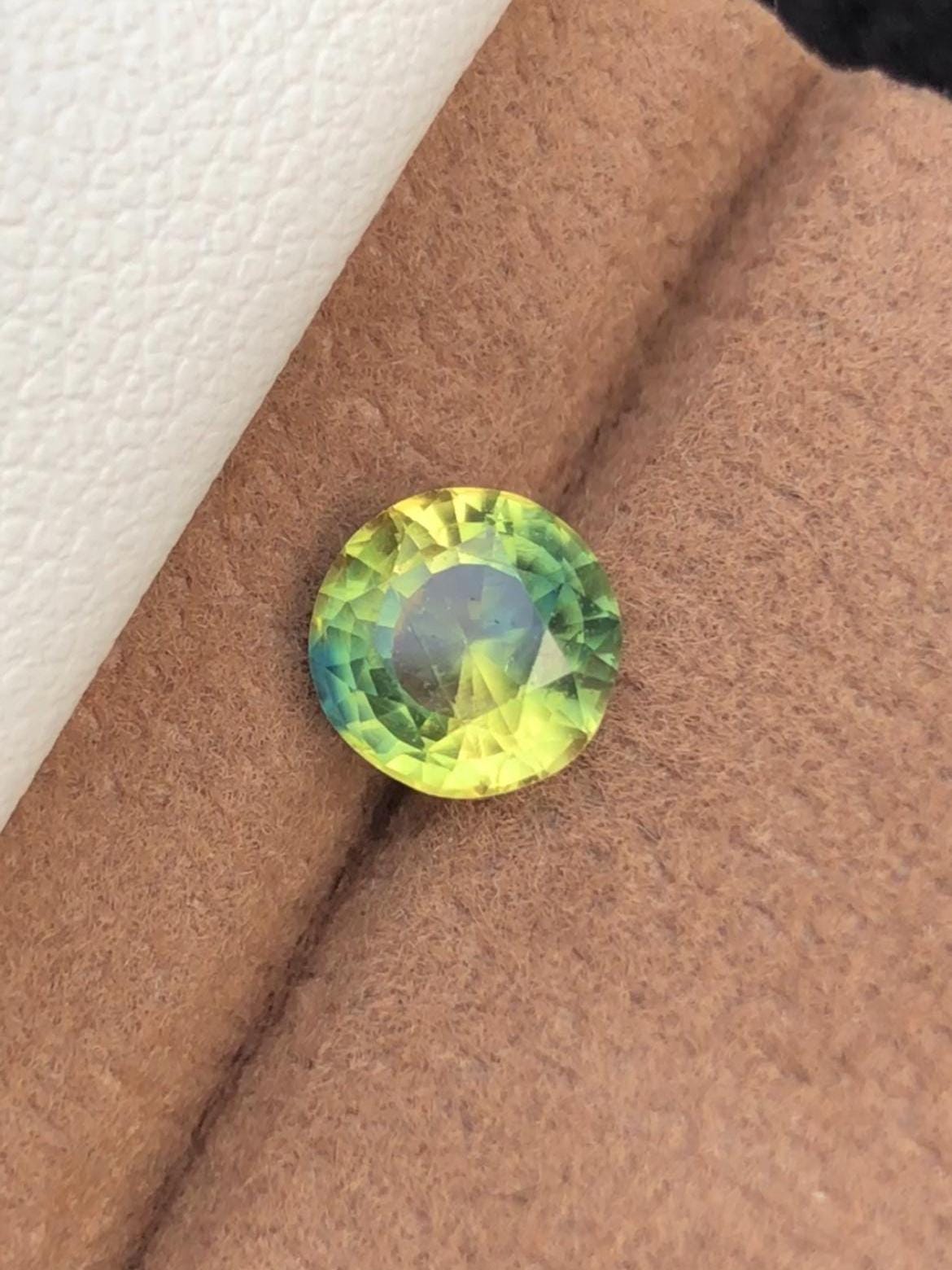 Bi-Color Sapphire 1.53ct Round Cut • Yellow & Blue Party Sapphire from Madagascar With Certificate