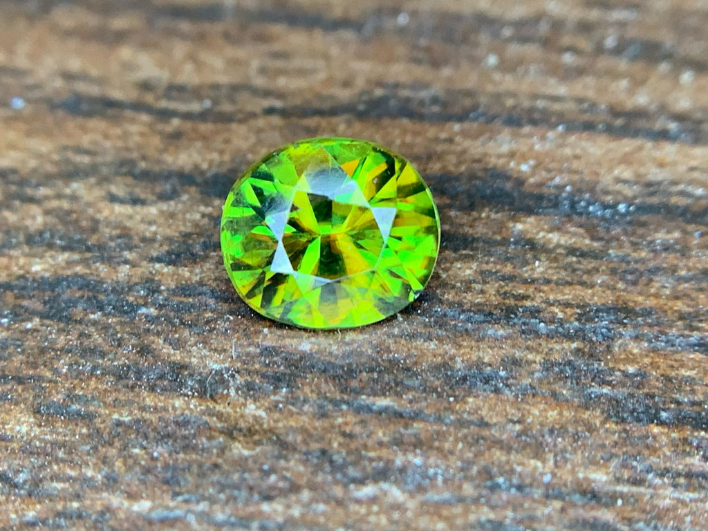 Natural Fire Sphene Gemstone: Round Cut, 0.95 ct, Himalayan Origin