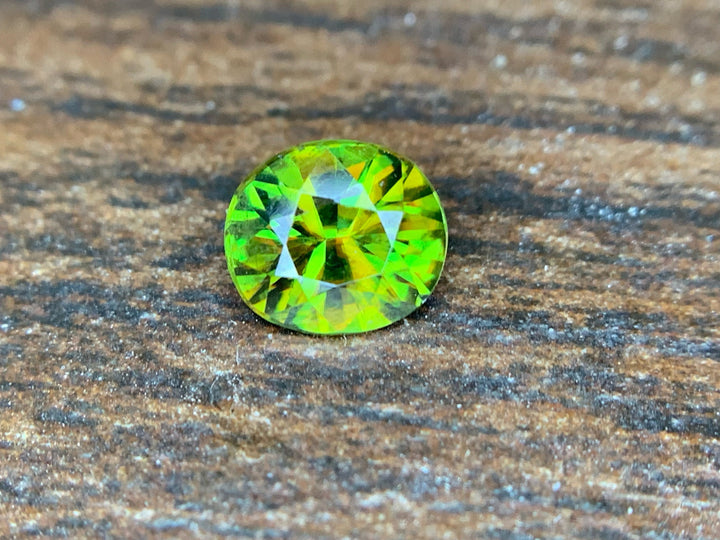 Natural Fire Sphene Gemstone: Round Cut, 0.95 ct, Himalayan Origin