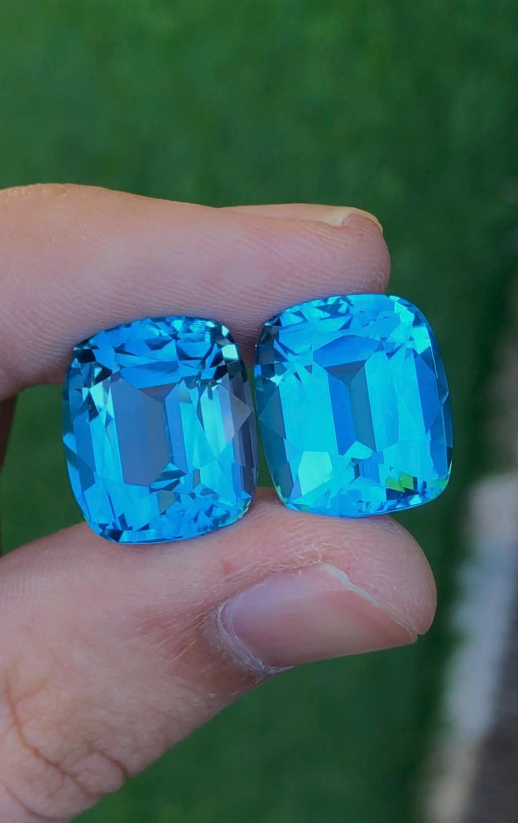 Electric Blue Topaz Gemstone Pair: 34.75 CT Cushion Cut