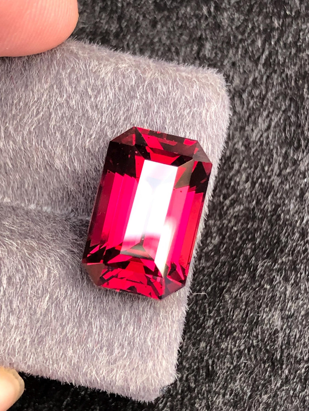 Red Rhodolite Garnet Emerald Cut 10.23 ct from Tanga Mine Tanzania