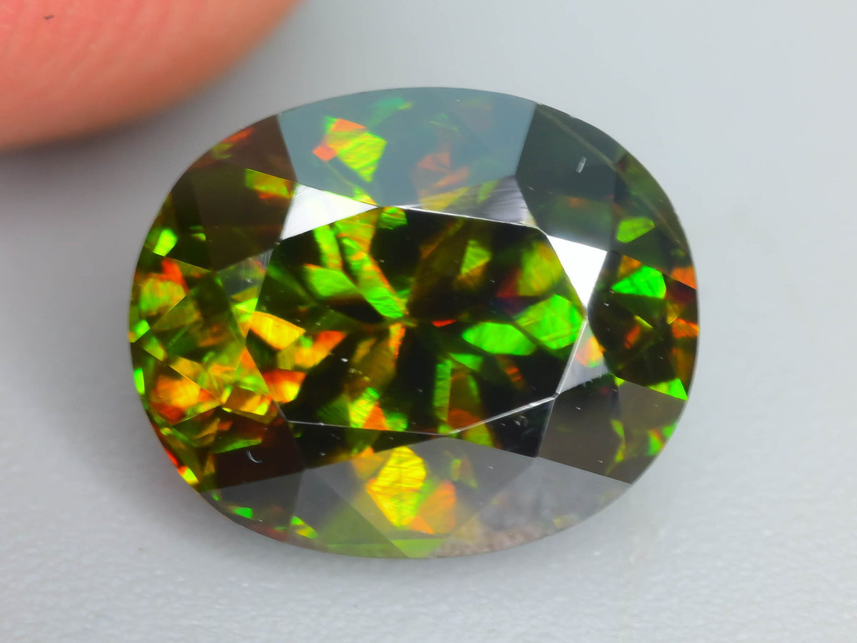 Chrome Sphene Gemstone: 1.55 Carat Faceted Oval, African Origin