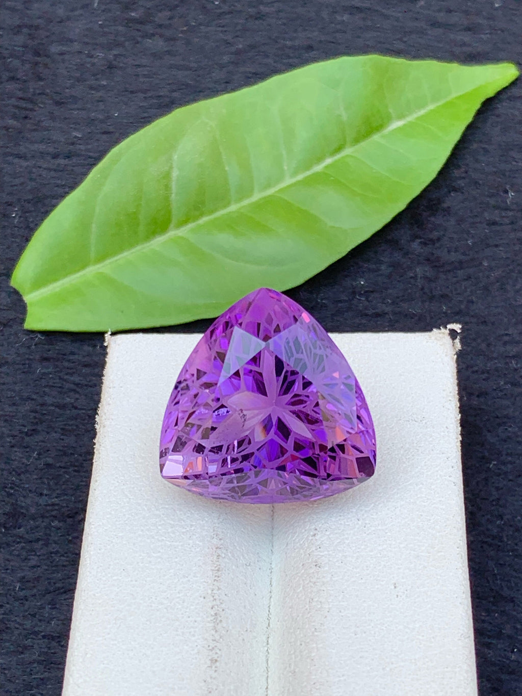 Triangular Amethyst Gemstone: 24.5 Carat Faceted Stone From Brazil