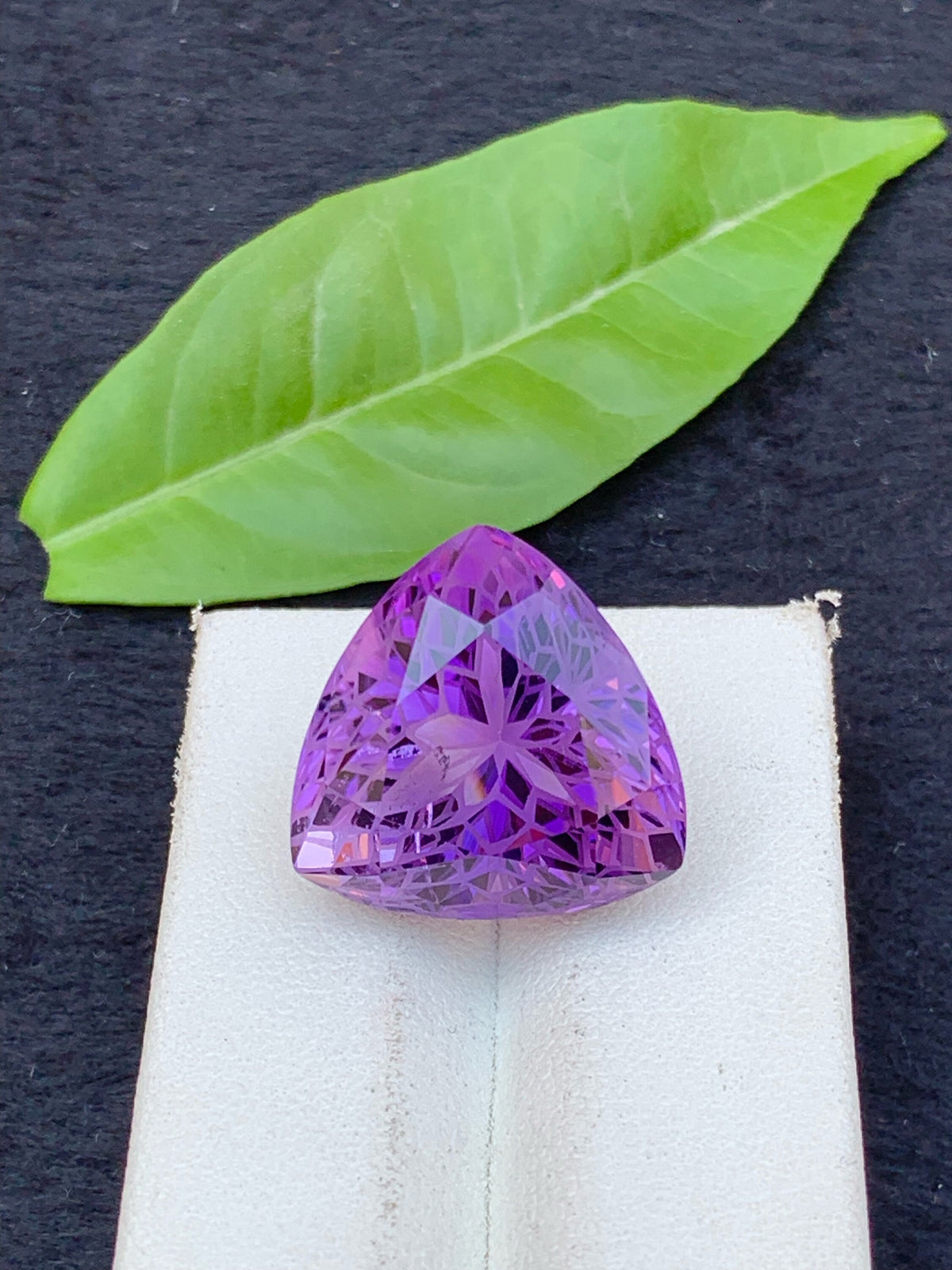 Triangular Amethyst Gemstone: 24.5 Carat Faceted Stone From Brazil
