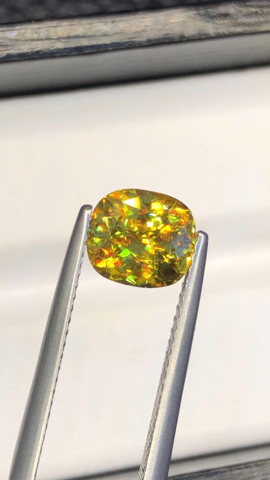 2.05 CT Cushion Cut Sphene Gemstone: Yellow-Red Trichroism