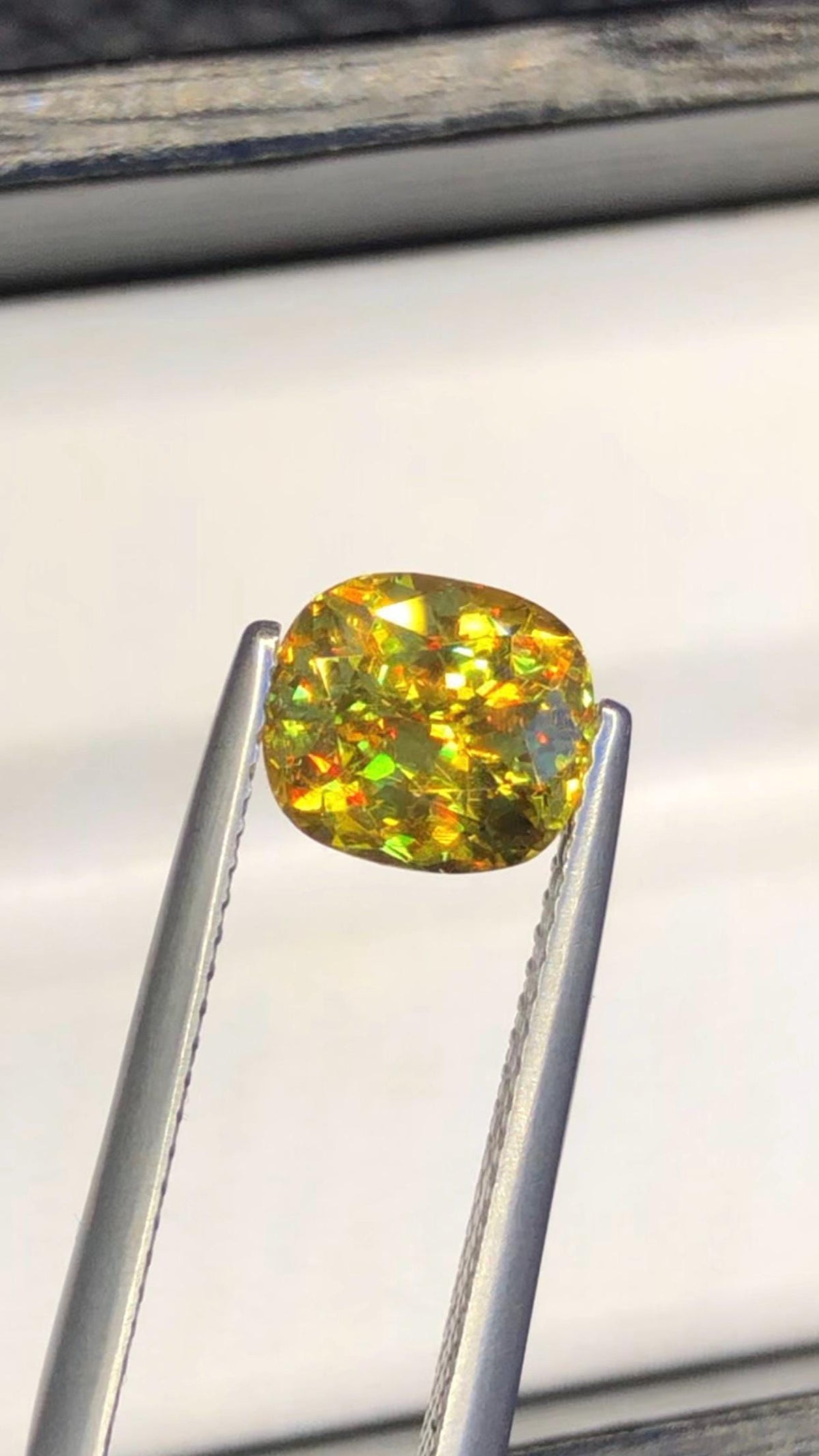 2.05 CT Cushion Cut Sphene Gemstone: Yellow-Red Trichroism