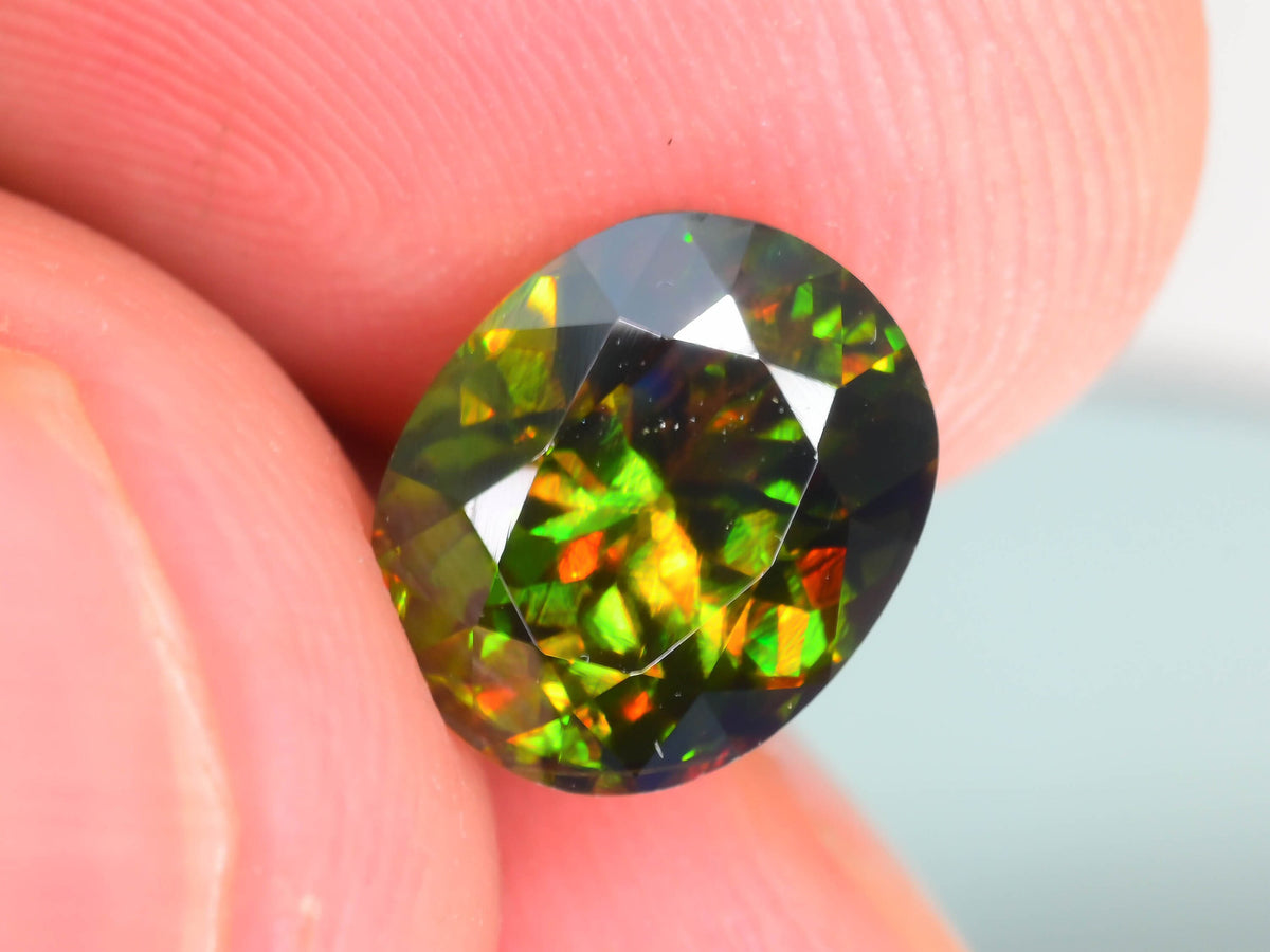 Chrome Sphene Gemstone: 1.55 Carat Faceted Oval, African Origin