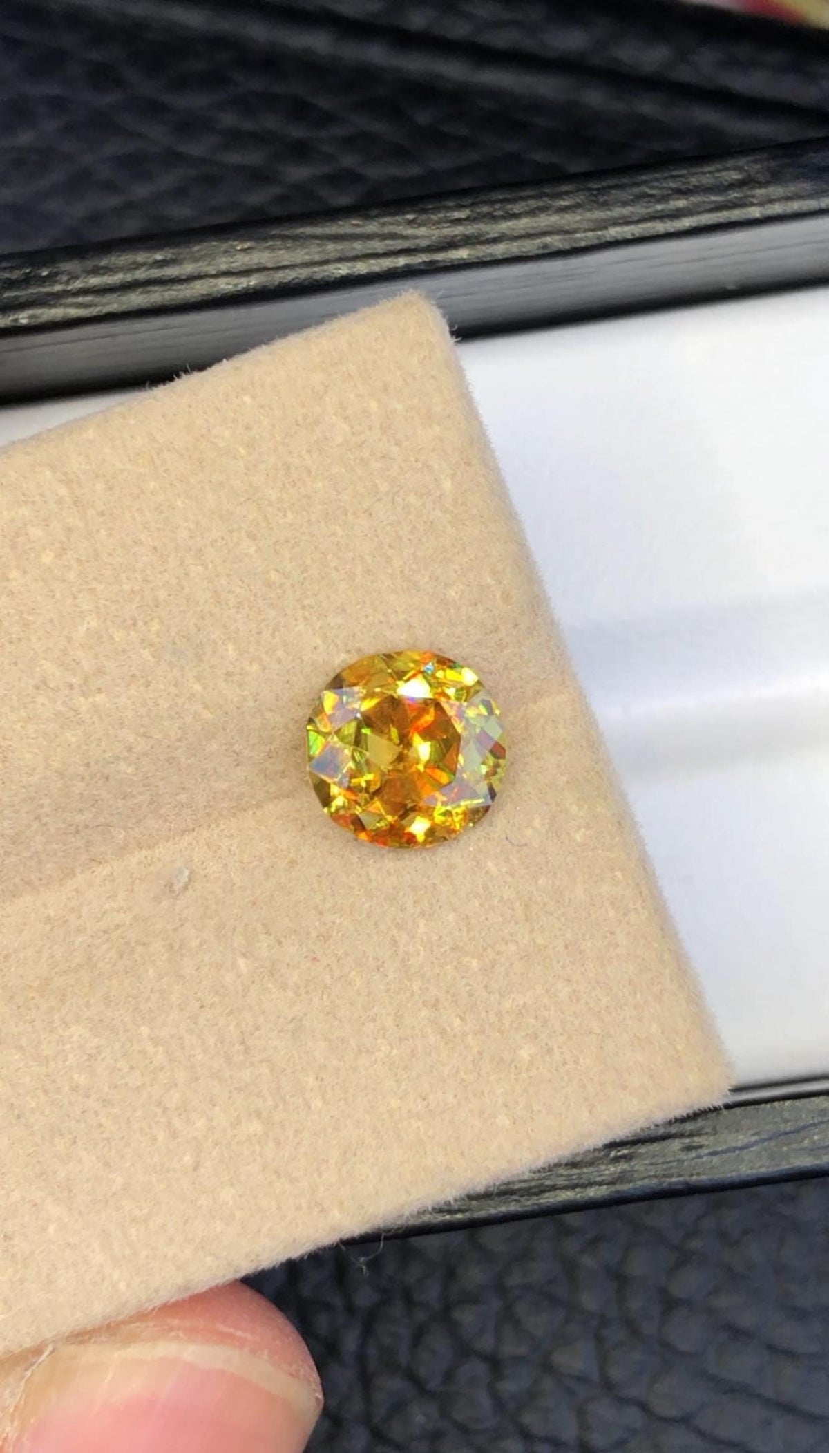 Natural Fire Sphene Gemstone: Round Cut, 1.45 CT, Himalayan Origin