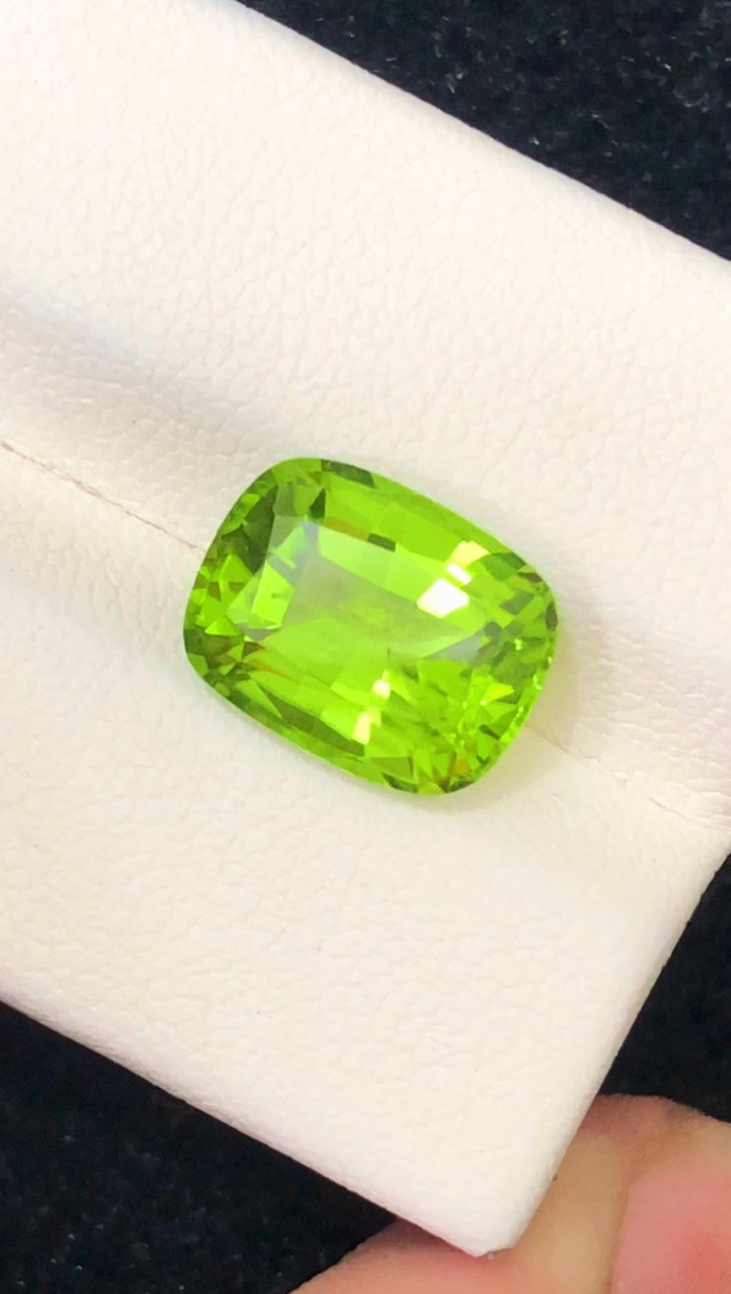 Green Peridot Cushion Cut in 5.15ct from Pakistan