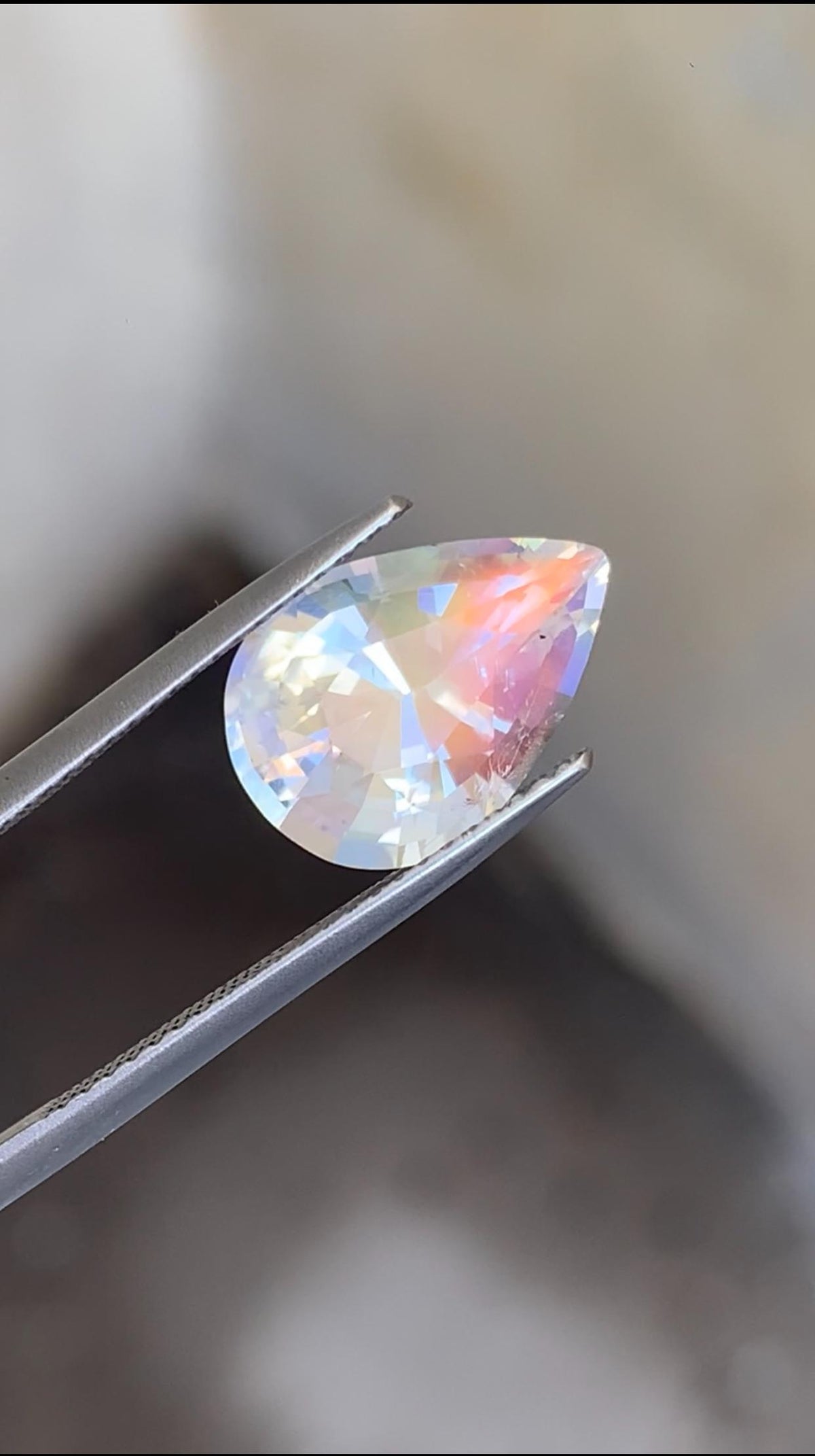 Rainbow Moonstone Gemstone: Pear Shape, VVS Clarity, Madagascar Origin