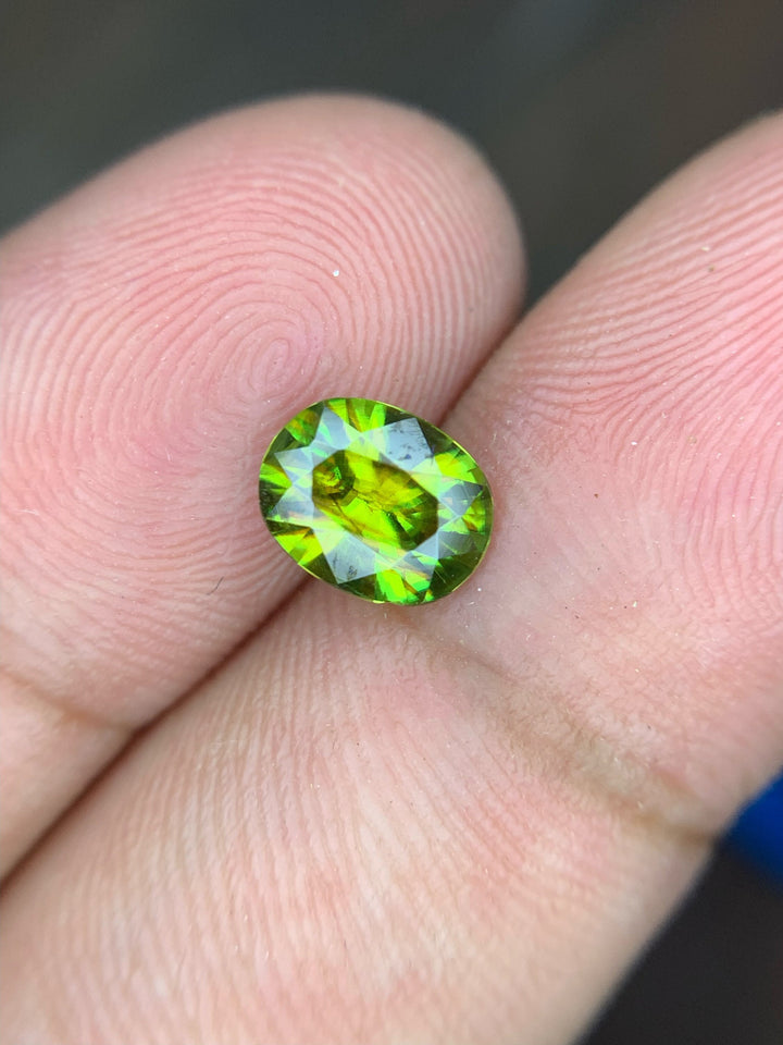 AAA Green Sphene Gemstone: Oval Cut, 0.95 CT, Himalayan Origin