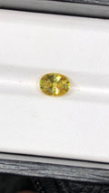 Natural Fire Sphene Gemstone: Oval Cut, 1.45 CT, Himalayan Origin