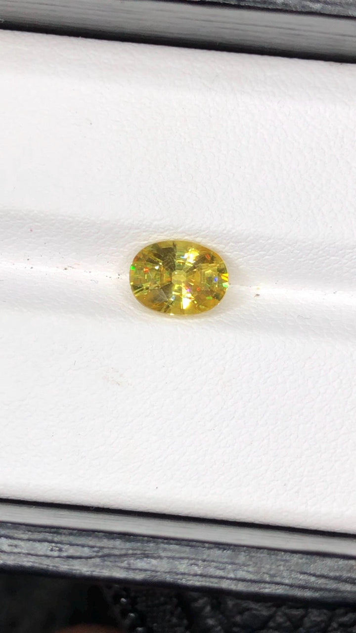Natural Fire Sphene Gemstone: Oval Cut, 1.45 CT, Himalayan Origin