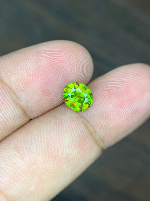 1.10 CT Natural Sphene Gemstone: Oval Cut, Himalayan Origin