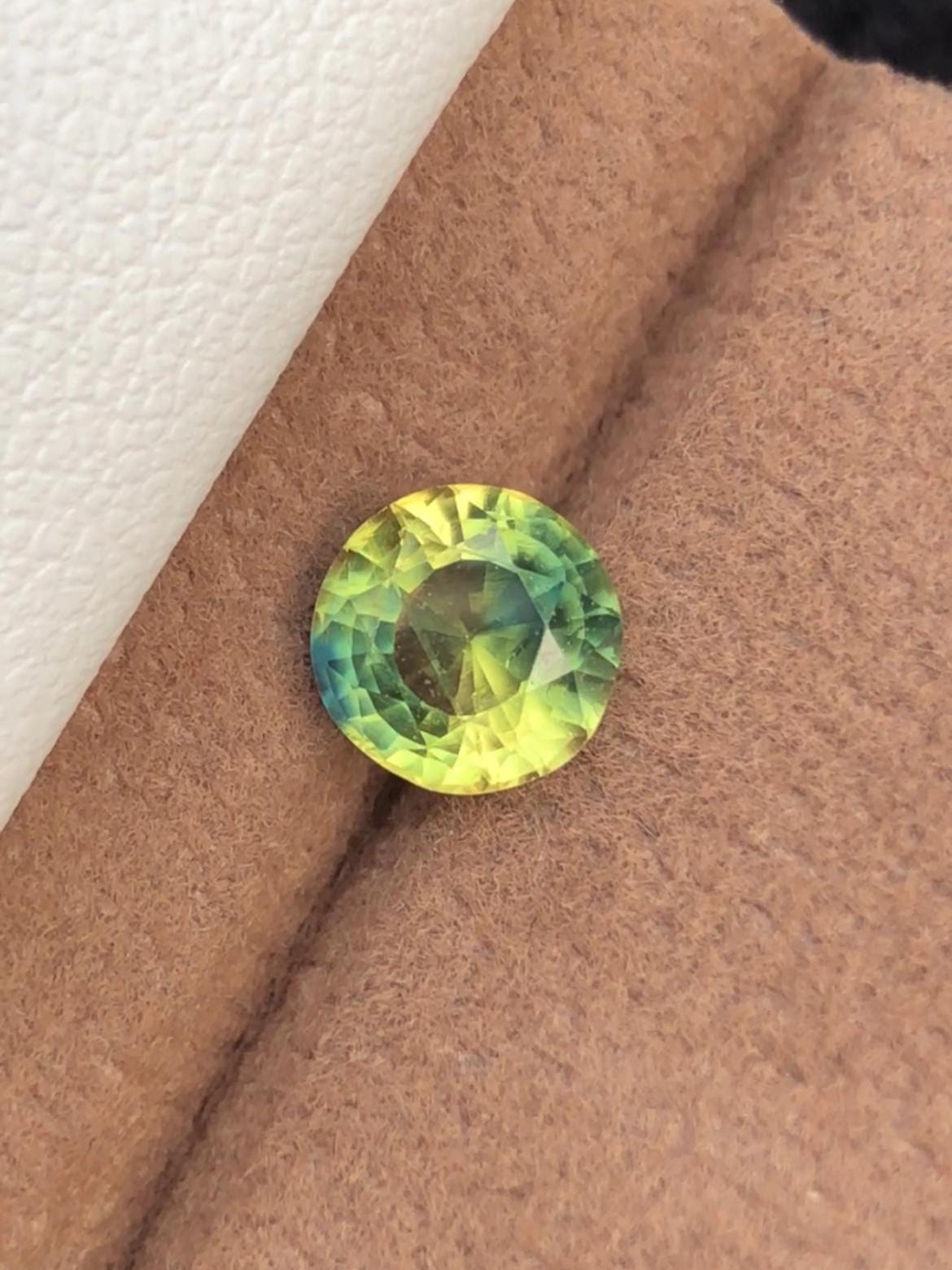Bi-Color Sapphire 1.53ct Round Cut • Yellow & Blue Party Sapphire from Madagascar With Certificate