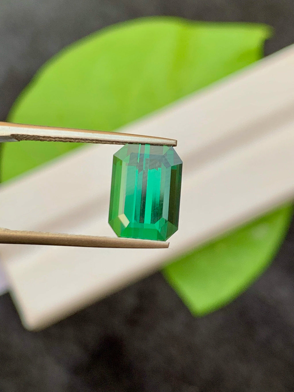 3.95 CT Forest Green Tourmaline Gemstone: Emerald Cut, Afghanistan Origin