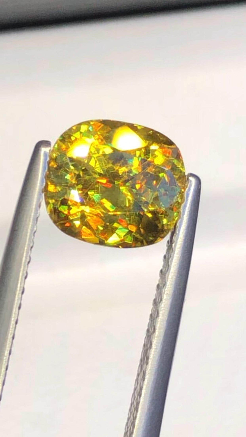 2.05 CT Cushion Cut Sphene Gemstone: Yellow-Red Trichroism