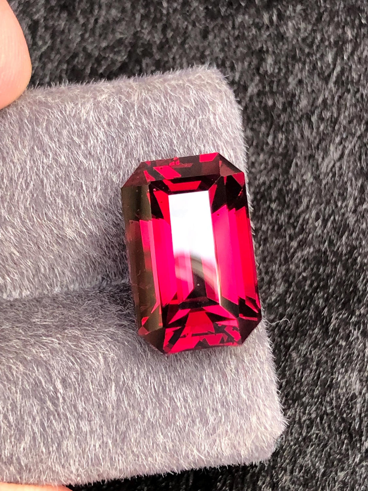 Red Rhodolite Garnet Emerald Cut 10.23 ct from Tanga Mine Tanzania