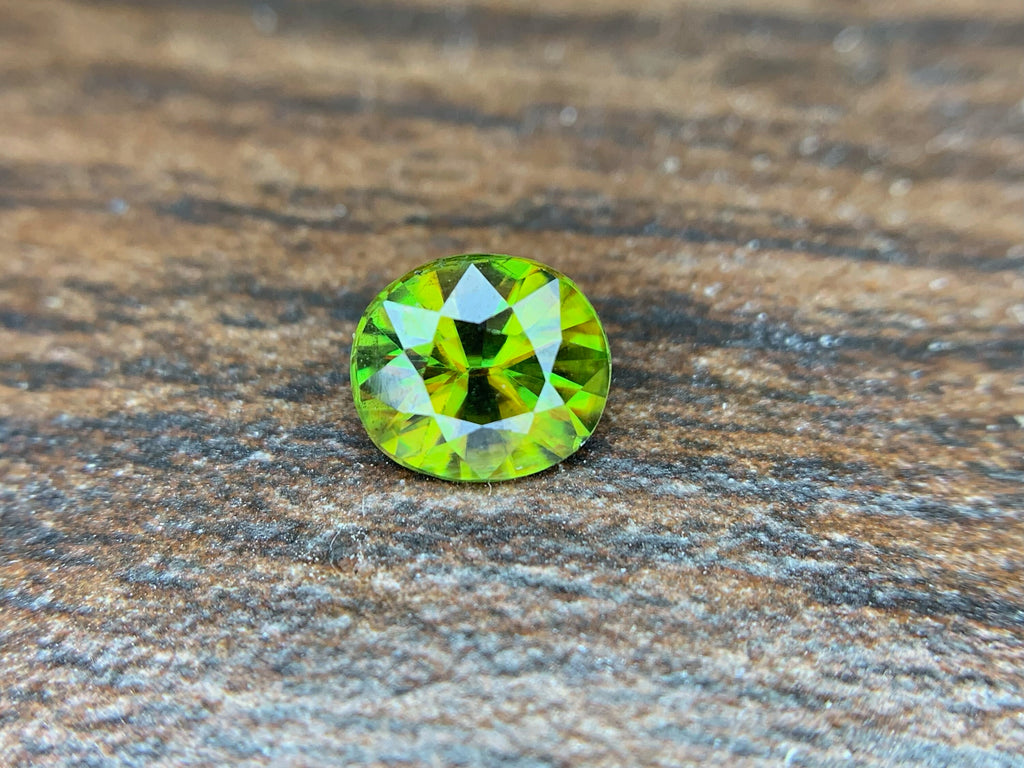 Natural Fire Sphene Gemstone: Round Cut, 0.95 ct, Himalayan Origin