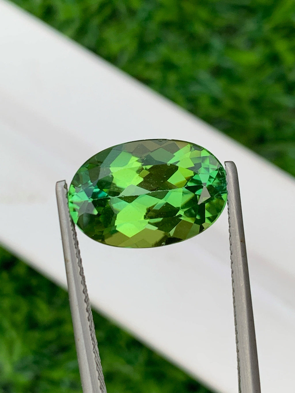 Vibrant Green Tourmaline Gemstone: Oval Cut, 6.60 CT, VVS Clarity