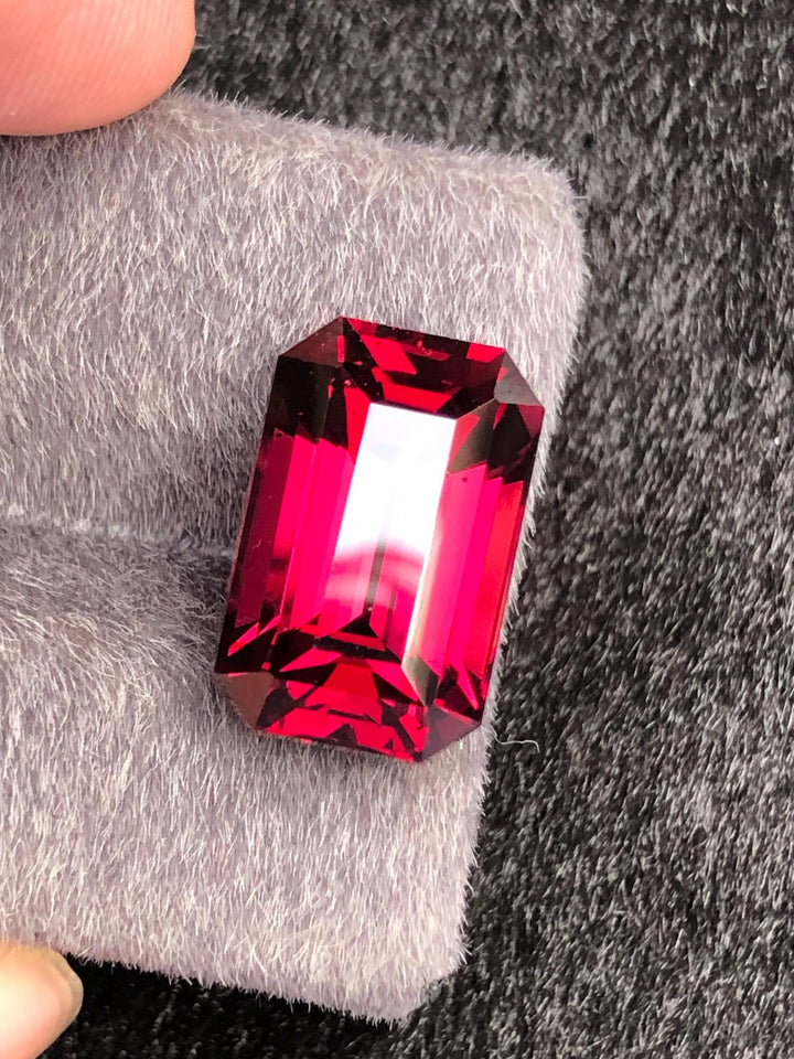 Red Rhodolite Garnet Emerald Cut 10.23 ct from Tanga Mine Tanzania
