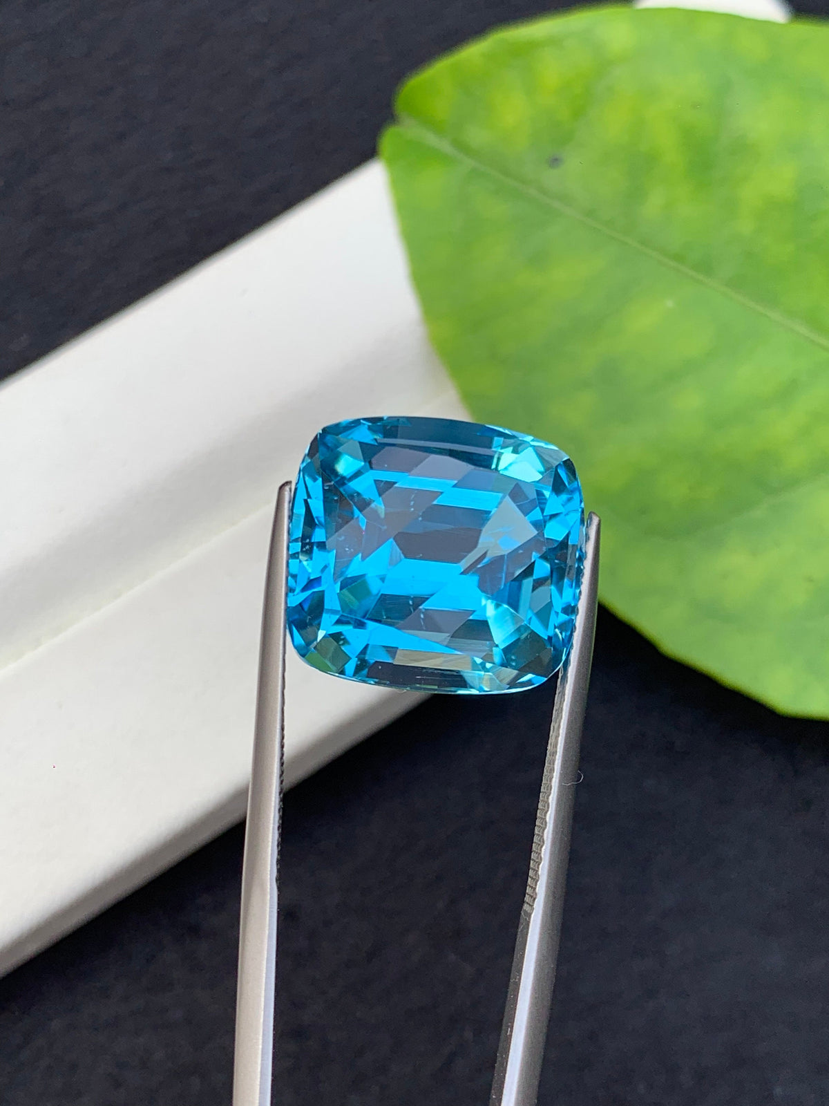 21.5 CT Swiss Blue Topaz Gemstone: Step Cushion Cut, Loupe Clean