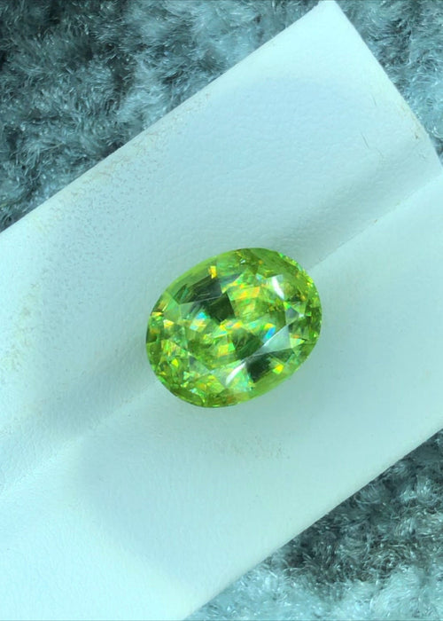 Apple Green Sphene Gemstone: Oval Cut, 8.85 CT, Himalayan Origin