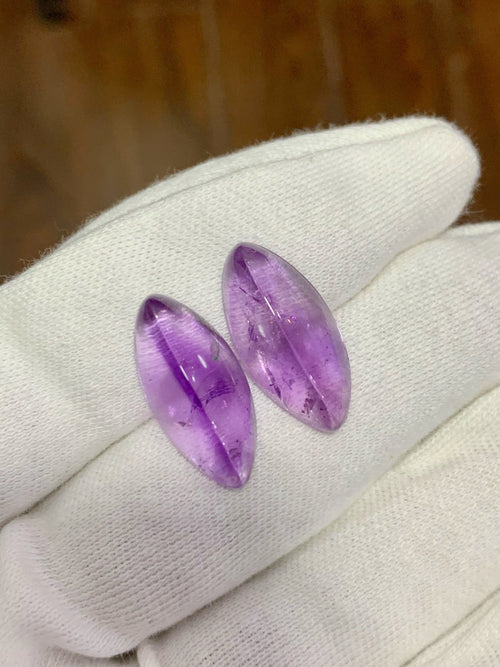 Amethyst Cabochon Pair: 32.70 Carat Deep Purple Gemstone
